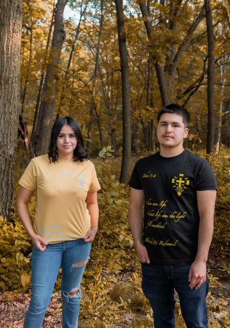 the founders of blessed & redeemed standing in front of some autumnal trees